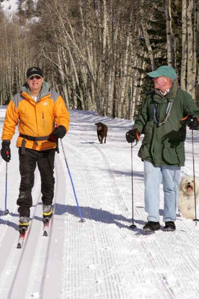 John Wilcox (left) enjoys cross country skiing with friend, Rick Bourke